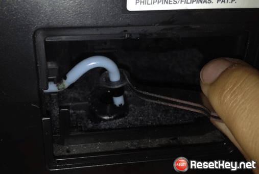 take off Epson Stylus NX625 printer's waste ink tube